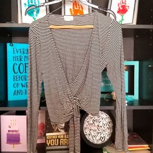 Long sleeve wrap top.